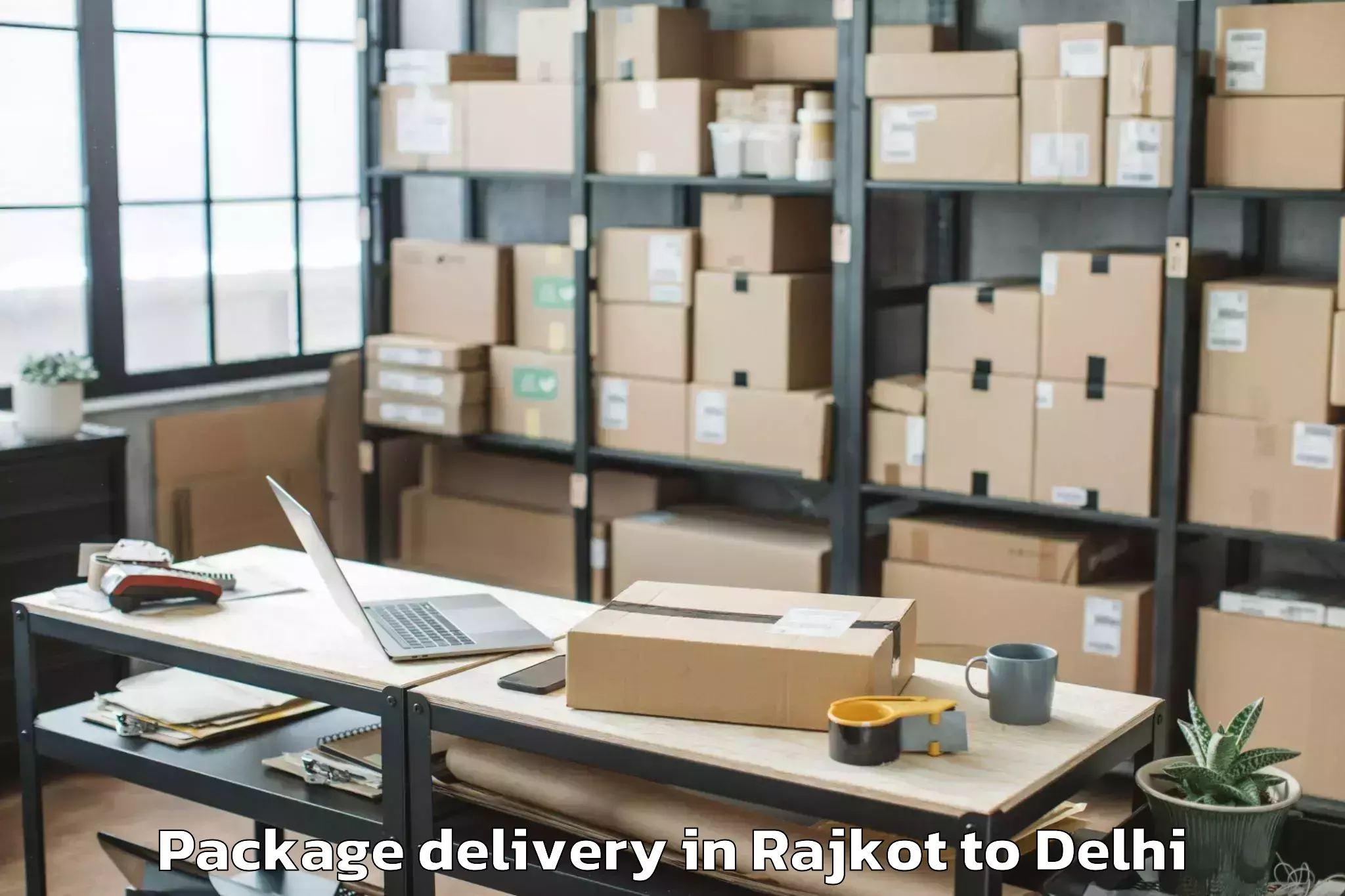 Trusted Rajkot to Chanakya Puri Package Delivery